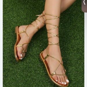 Rose gold lace up sandals